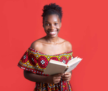 attractive-young-woman-traditional-dress-with-book-her-hands (1)