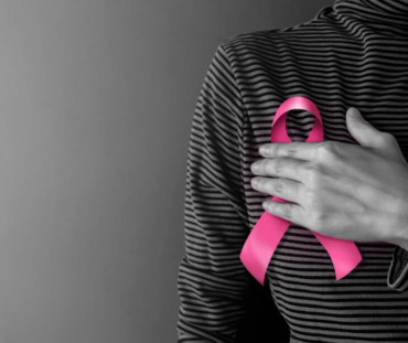 breast-cancer-awareness-campaign-concept-women-s-healthcare-woman-touching-pink-ribbon (1)